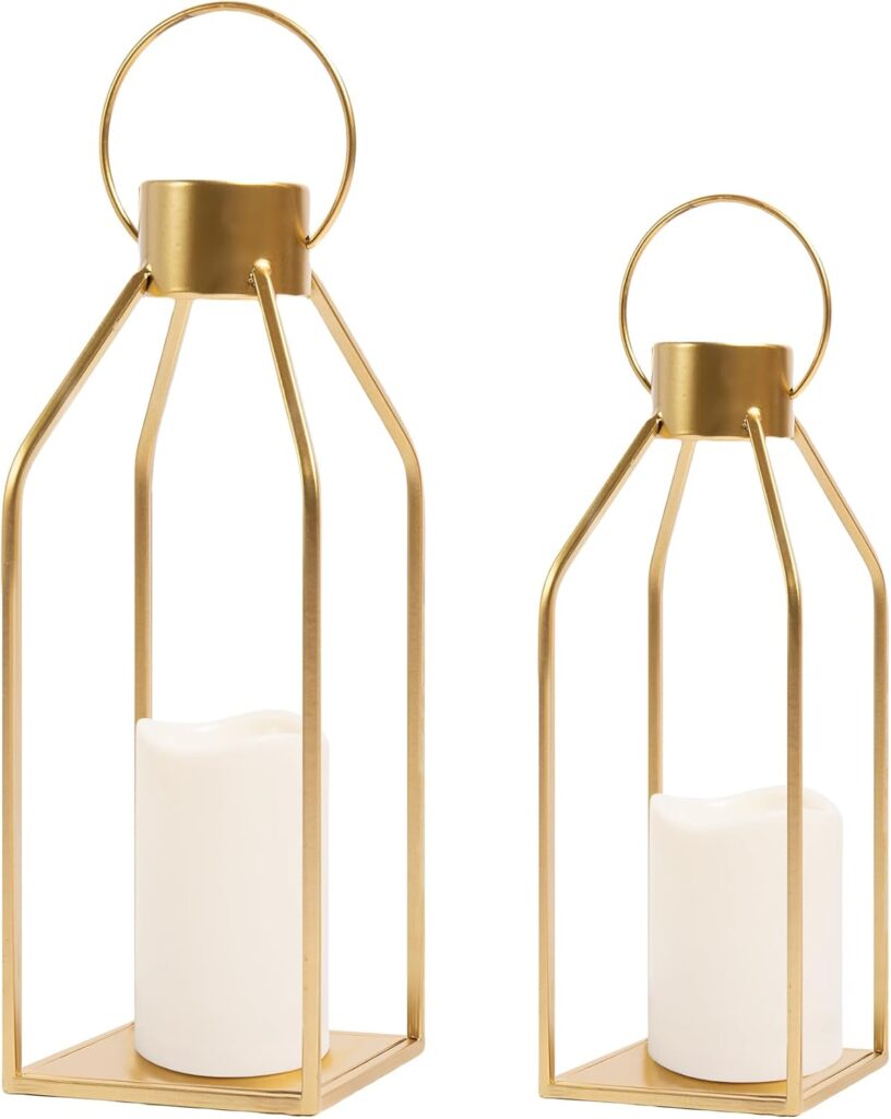 A large black metal and glass lantern with a flickering flameless candle inside, styled as a floor accent in a farmhouse-style room.