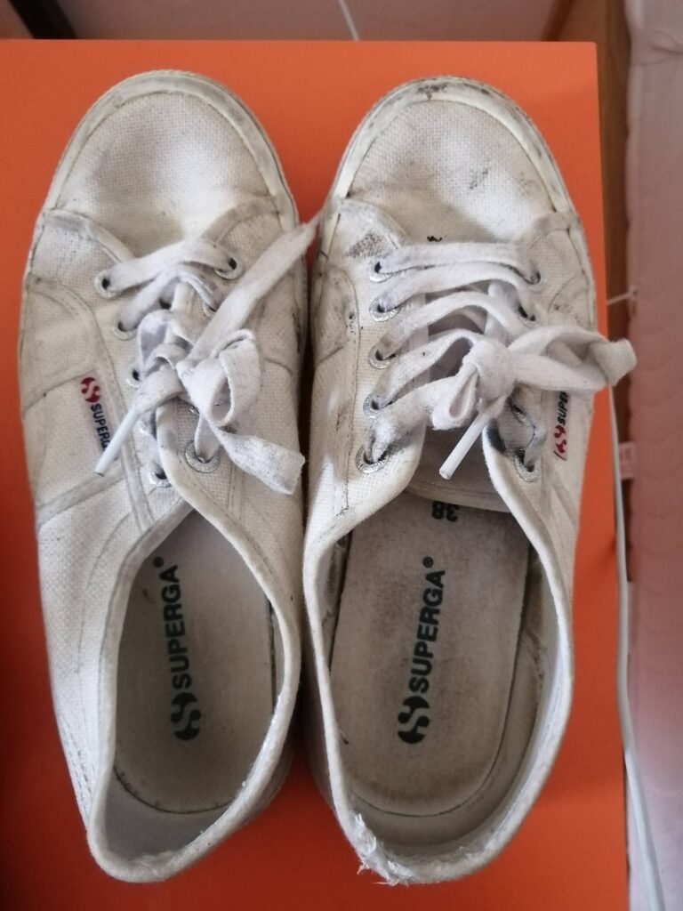 Worn white sneakers after 3 weeks in Vienna