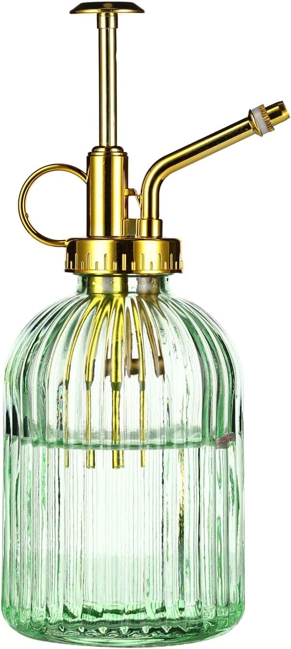 Emerald glass vintage watering mister, a cozy Amazon garden find for spring.