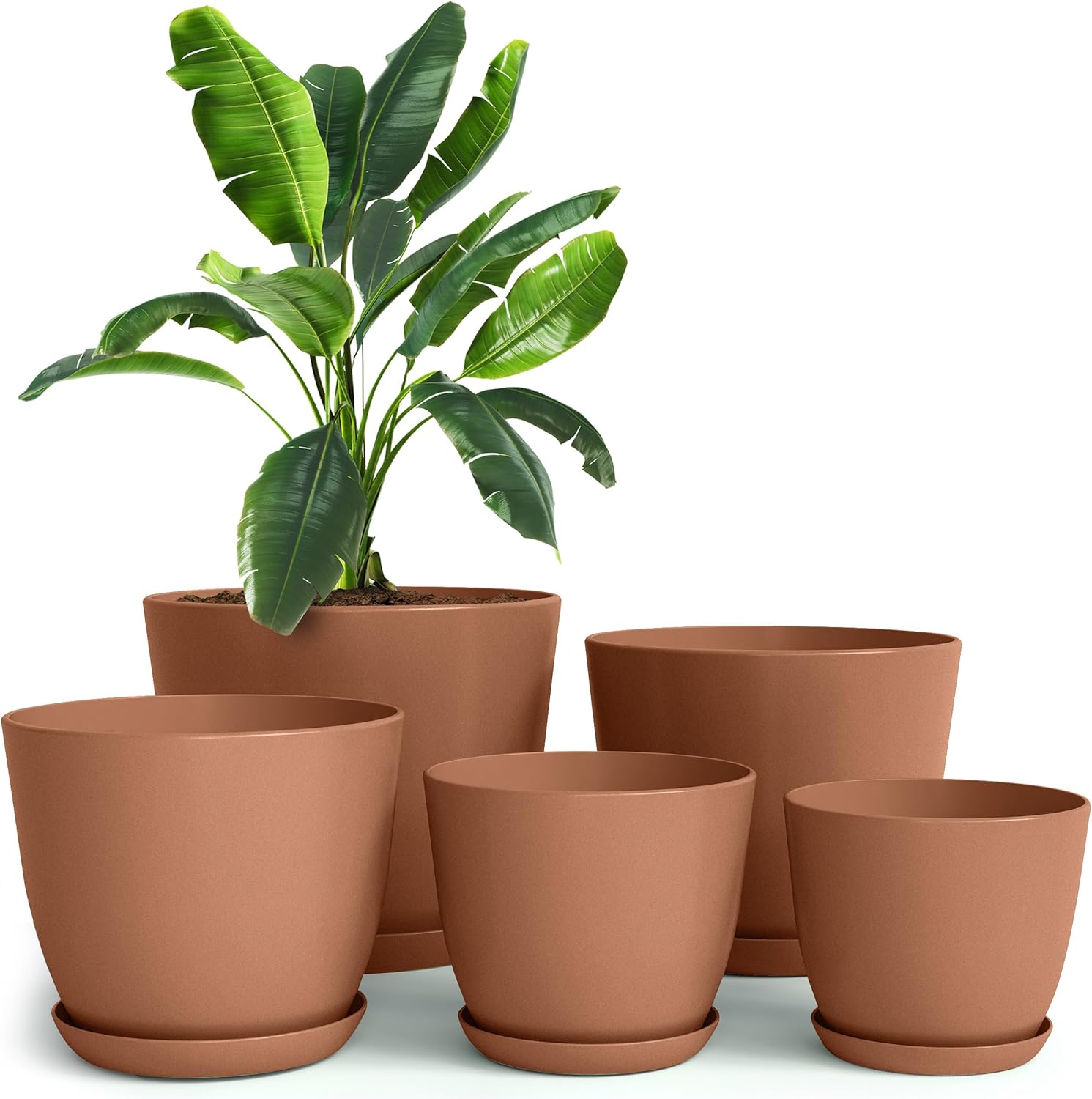 Stack of classic terracotta pots, a cottagecore essential for spring gardening.